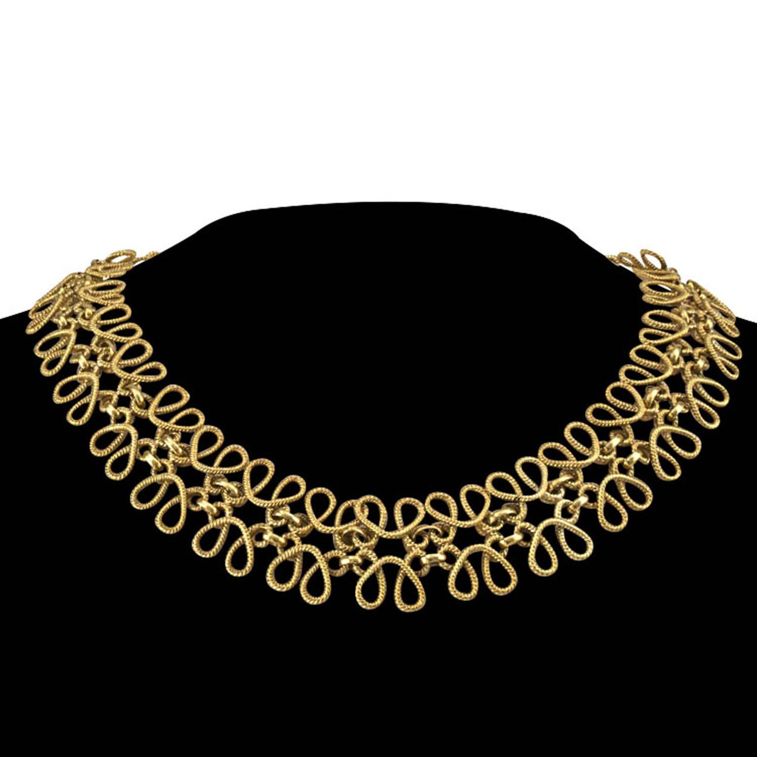 Handwoven 18 Karat Gold Necklace Circa 1960

Supple and lace like, the 7/8