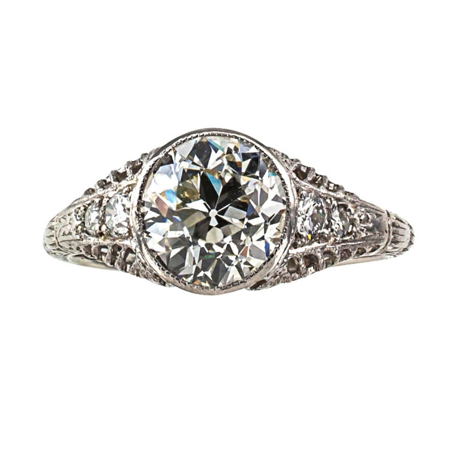 1.84 Carats Edwardian Diamond Engagement Ring

Edwardian masterpiece, distinctive and gorgeous, showcasing an old European-cut diamond weighing 1.84 carats, accompanied by a GIA report stating that the diamond is K color and VS2 clarity, between