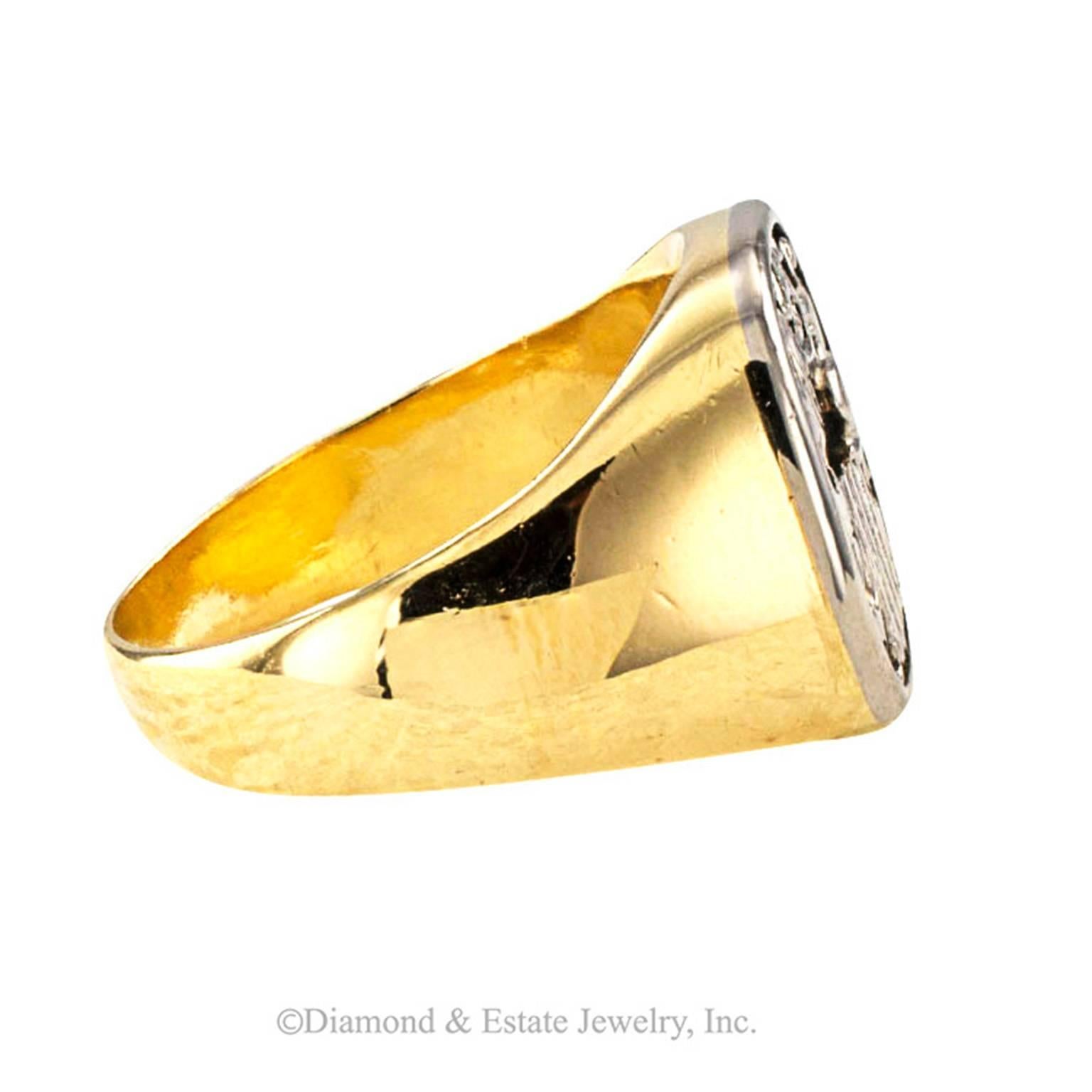  Two-tone Gold Crest Ring

Outstandingly handsome, this mid century crest ring makes a bold statement... classic and refined masculine elegance.  Two-tone 18 karat gold.
RING SIZE:  11 1/4, a jeweler can size it.
 Approximately 11/16" long