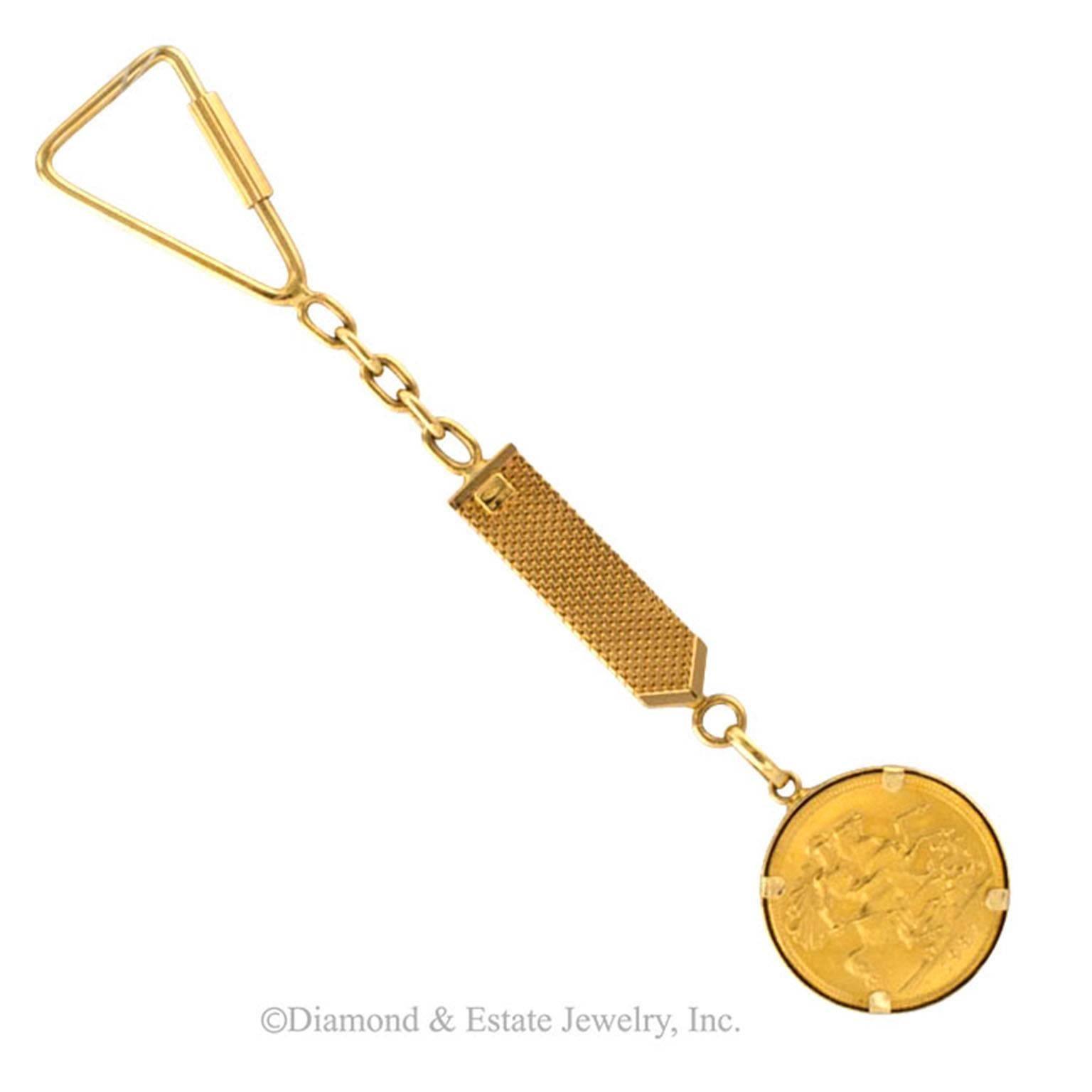 English Sovereign and 18 Karat Gold Key Chain Fob

Handsome and extremely useful, luxurious, for sure.  How nice is having an 18 karat gold key chain fob?  Or how about a perfectly decadent gift for someone who... "has Everything!!!"  