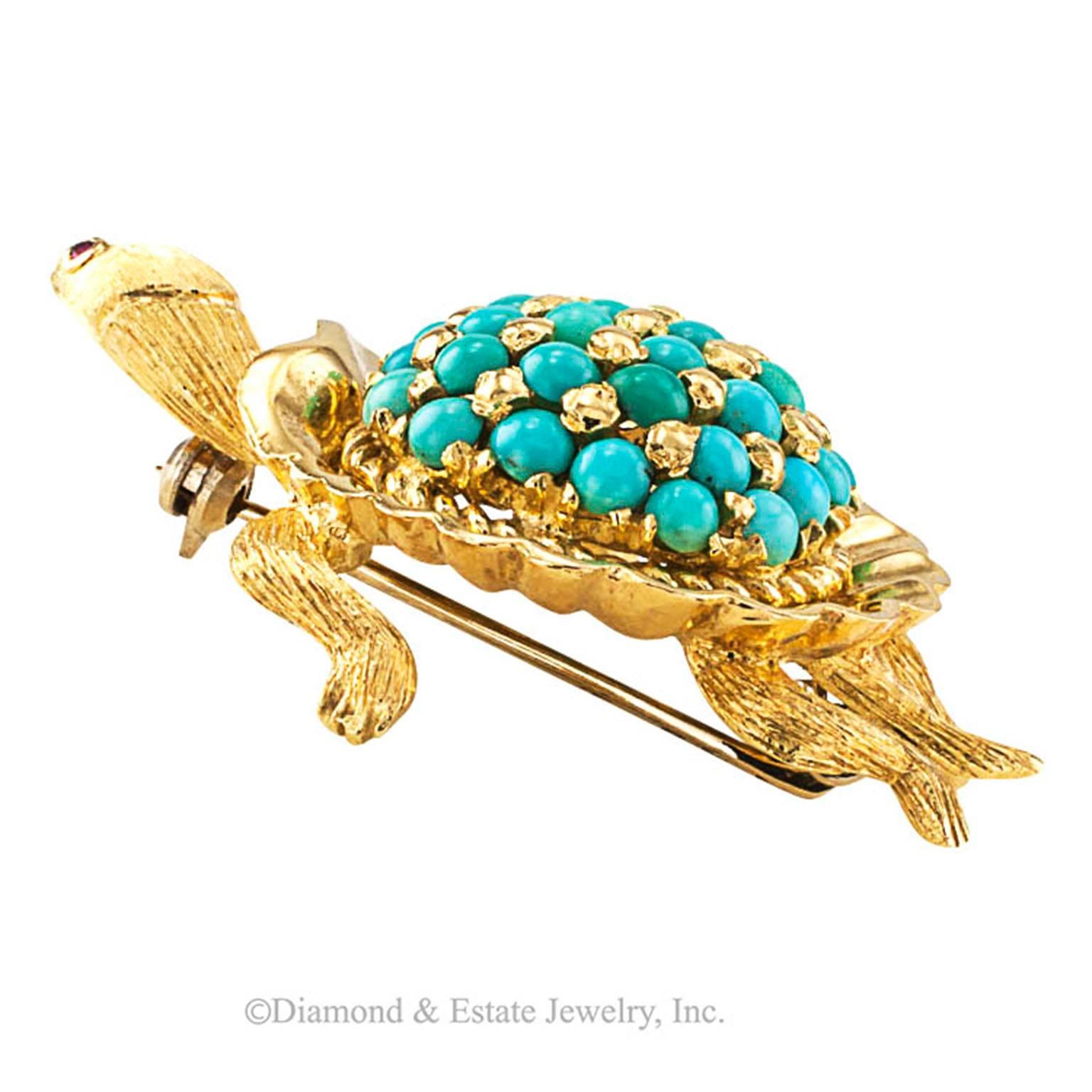 Turquoise and Ruby Sea Turtle Brooch Circa 1960

It is so easy to fall in love with sea turtles... seeing them in their own environment they appear so graceful, as if effortlessly flying through the water, and they are so colorful too.  This 18