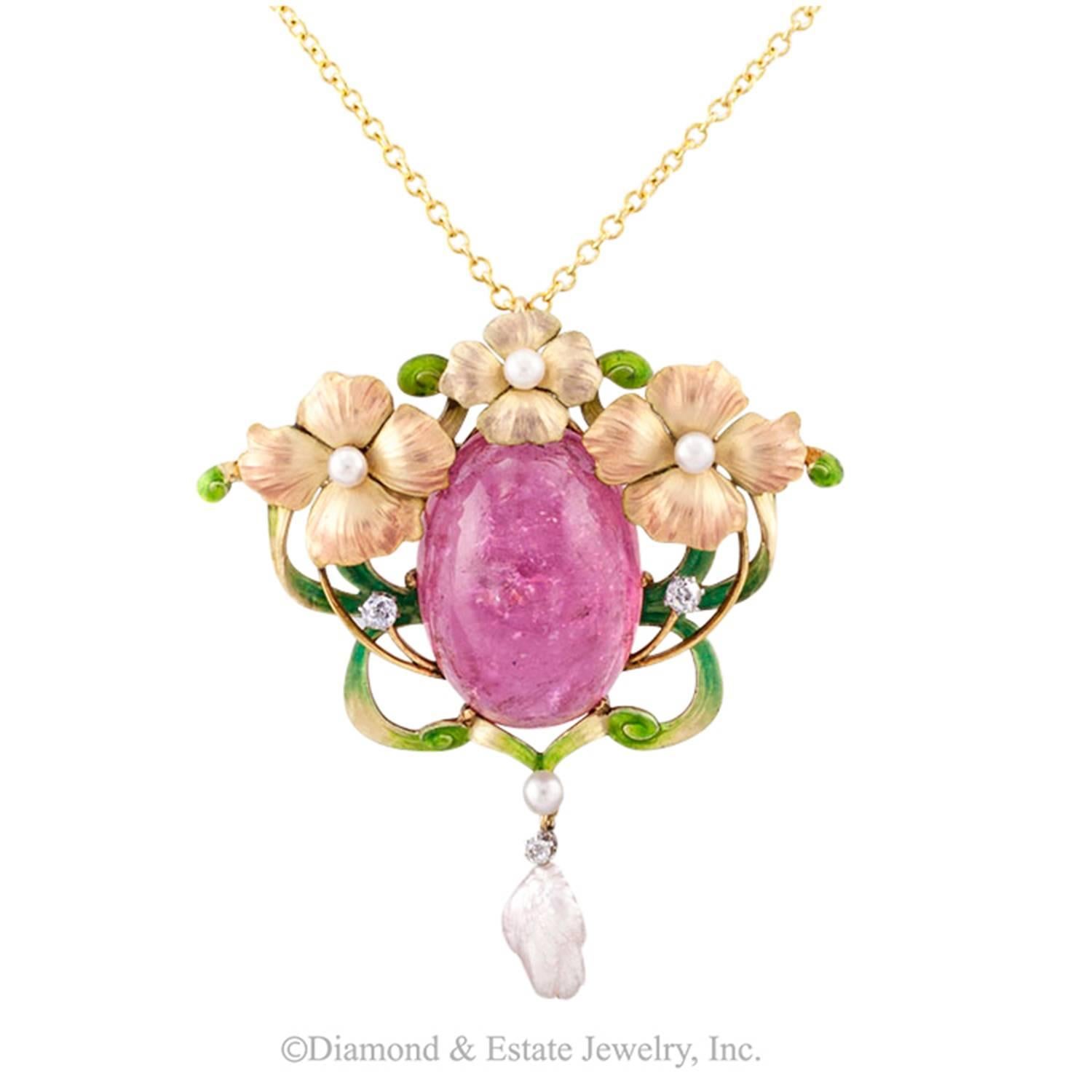 Art Nouveau Pink Tourmaline Enamel Diamond and Pearl Brooch/Pendant

This is what a vision of loveliness looks like.  The colors play off each other beautifully, unexpectedly.  A larger jewel that will be noticed when worn, whether as a brooch or