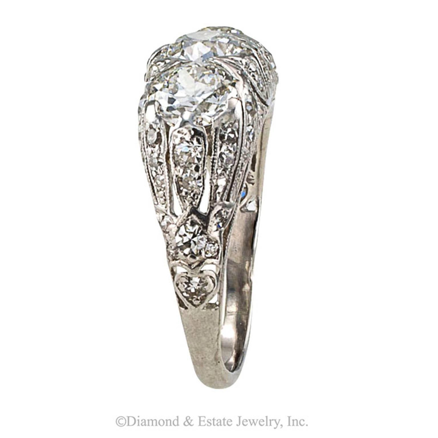 Edwardian Three-stone Diamond Ring

Beauty such as this, and nothing less, to symbolize a loving relationship between two people.  I give you three big diamonds, my love... my love from yesterday, my love of today and my love for tomorrow. 