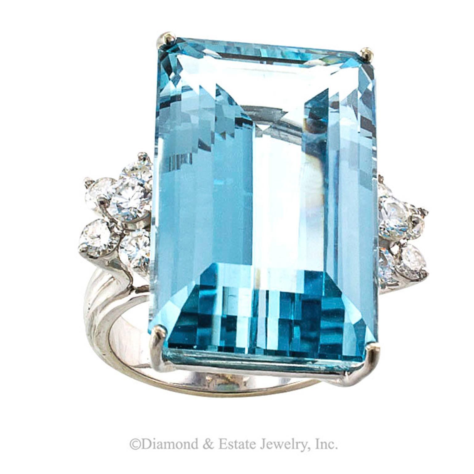 Midcentury Aquamarine and Diamond Cocktail Ring

Aquamarines are total eye candy when they are as blue and bright as this one is.  Cuddled at the shoulders by ten round brilliant-cut diamonds totaling approximately 0.85 carat, approximately G - H