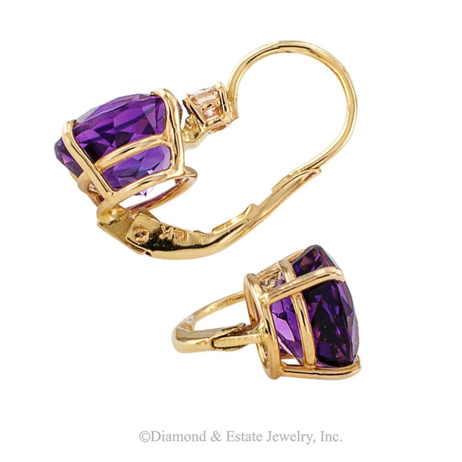 Amethyst and Diamond Earrings

If you want a nice pair of amethyst earrings that will do double duty, casual and dressy, these are pretty good candidates.  Practical everyday wear earrings.  Well matched and vibrant amethyst together weighing 5.71