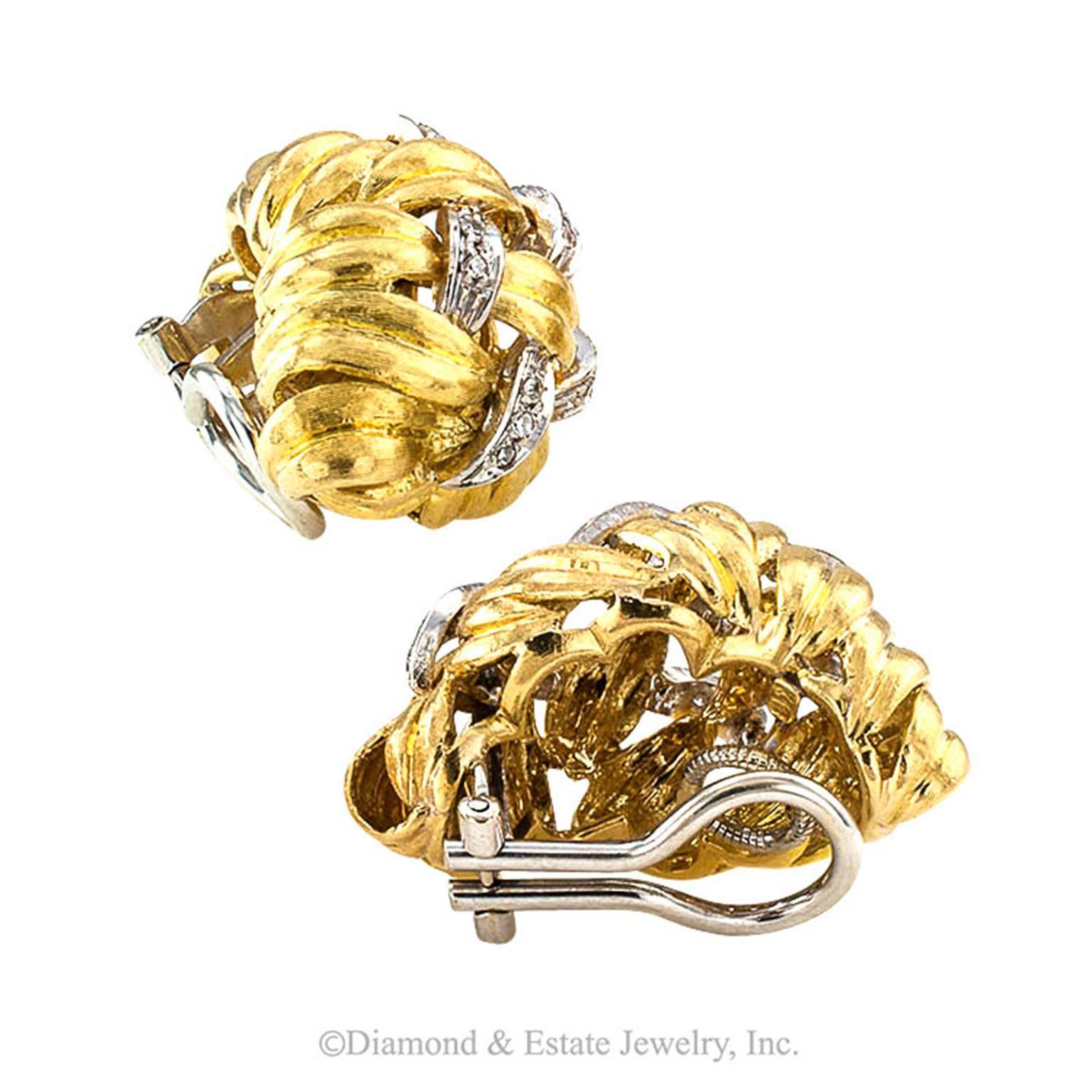 Diamond Gold Domed Basket Weave Ear Clips

The Florentine finish gives the gold a rich satin look in this basket weave design accented with diamonds totaling approximately 1/3 carat.  A very good example of good jewelry that looks a lot more