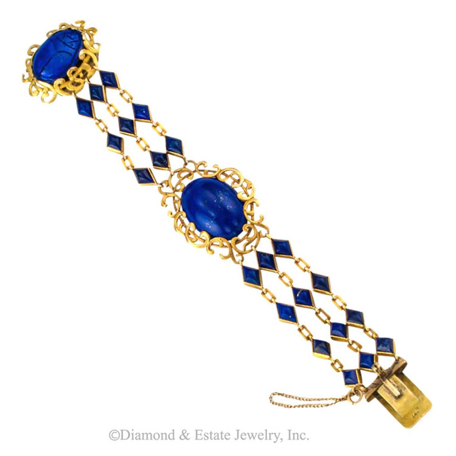 Arts and Crafts Lapis Lazuli Link Bracelet

A significant amount of handiwork distinguishes this most unique and cleverly designed Arts And Crafts bracelet comprising bezel-set diamond-shaped lapis lazuli links contrasting a large central oval
