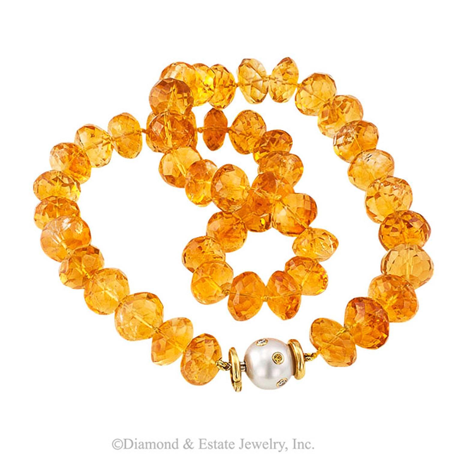 Seaman Schepps Faceted Citrine Bead Necklace

Composed as a single strand of faceted Citrine beads weighing approximately 410.00 carats total, that sparkle like crystallized sunshine, completed by an 18 karat yellow gold clasp comprising a 12 mm