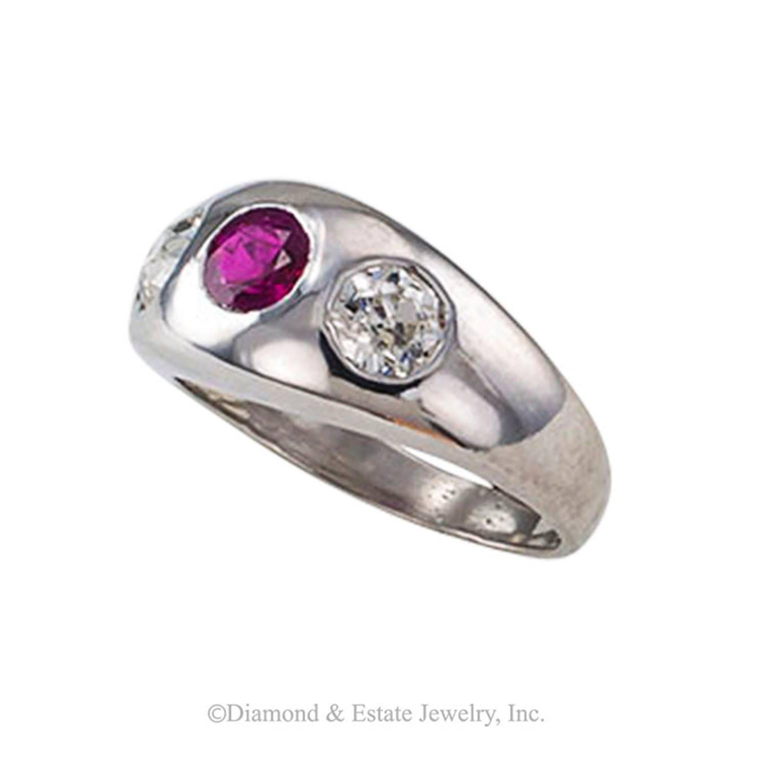 1910 Ruby and Diamond Three-Stone Gypsy Ring

Gypsy rings are so intriguing, and yet, the design is the ultimate classic style.  This petite version comes in a size 4+ showcasing a very pleasing ruby between a pair of old European-cut diamonds
