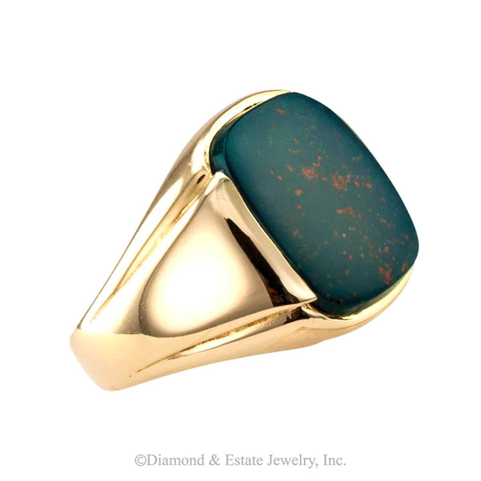 1940s Bloodstone Gentleman's Ring

A classic gentleman's ring featuring a fine bloostone specimen with an abundance of pronounced reddish markings, a very desirable quality.  Bloodstone is a form of chalcedony.  On the internet, there is a