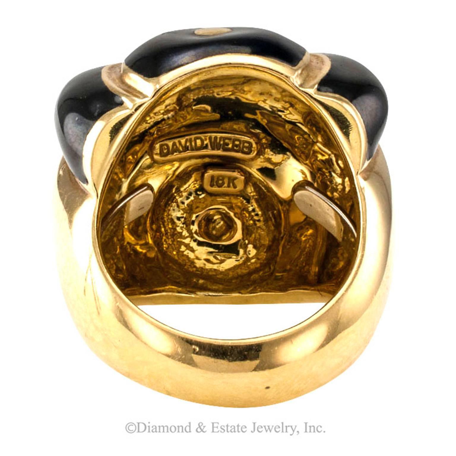 David Webb Black Enamel and Gold Ring

A very cool whimsical take on an abstract motif endowed with all those wonderful qualities that make owning a David Webb jewel such a delight.   Just knowing that it is Webb, David Webb, is thrilling... a