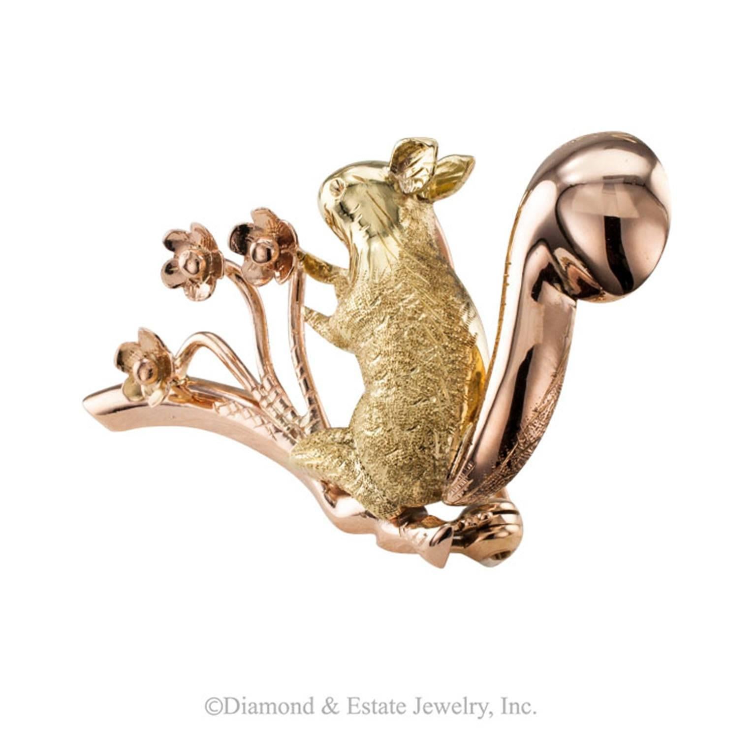 1950s Retro Red Squirrel Brooch Two-Tone 18-Karat Gold

Retro, red squirrel brooch crafted in pink and green 18-karat gold, dated on the back 6-7-58.  A whimsical and delightful squirrel brooch.  It is all gold, but the contrast between the pink