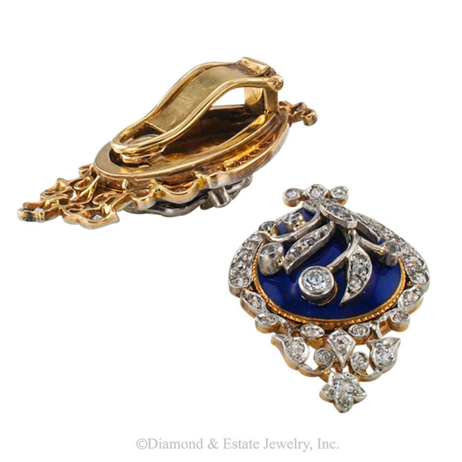 1890s Victorian Royal Blue Enamel and Diamond Ear Clips

Victorian blue enamel and diamond ear clips mounted in 14-karat gold and platinum, circa 1890.  There is something about this pair of antique earrings that makes them look very Regal.  Could