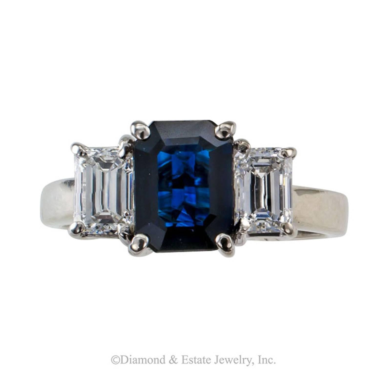 Emerald-Cut Blue Sapphire and Diamond Three-Stone Ring

Sapphire and diamond solitaire ring centering an emerald-cut blue sapphire weighing approximately 1.33 carats between a pair of similarly cut diamonds together totaling approximately 0.75