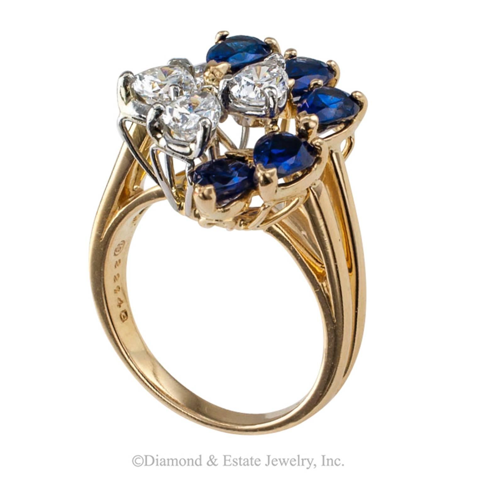 Oscar Heyman Sapphire and Diamond Cocktail Ring

 Oscar Heyman diamond and sapphire cocktail ring, circa 1970.  A dramatic arrangement of five pear-shaped diamonds set in platinum and five similarly cut sapphires set in 18-karat yellow gold lend