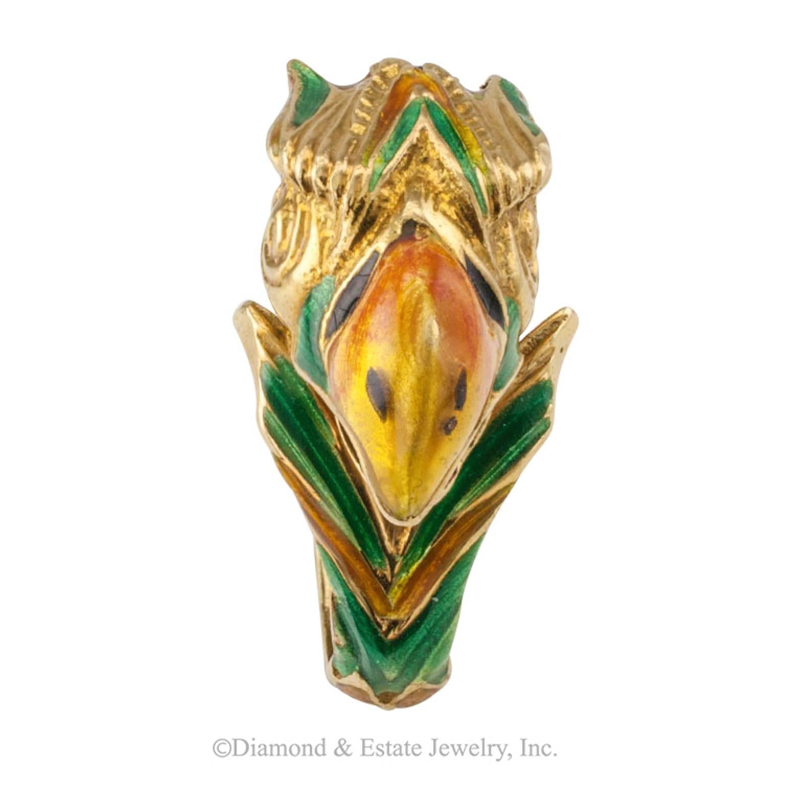 1970s Enamel and 18-Karat Gold Parrot Ring

Enamel and 18-karat gold parrot ring, circa 1970, ring size 4.  Of Italian origin, if this were a talking parrot, it would probably tell you that this ring cannot be sized... a Cinderella kind of story