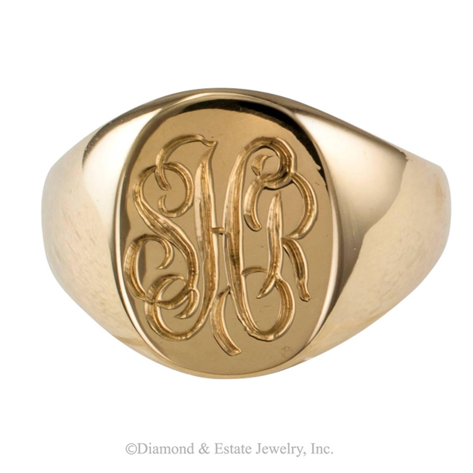 Tiffany & Co 18-Karat Gold Signet Ring

Tiffany & Co. classic 18-karat yellow gold signet ring circa 1970.
RING SIZE:  6 3/4+,
DIMENSION: 9/16" wide vertical to the fingernail.