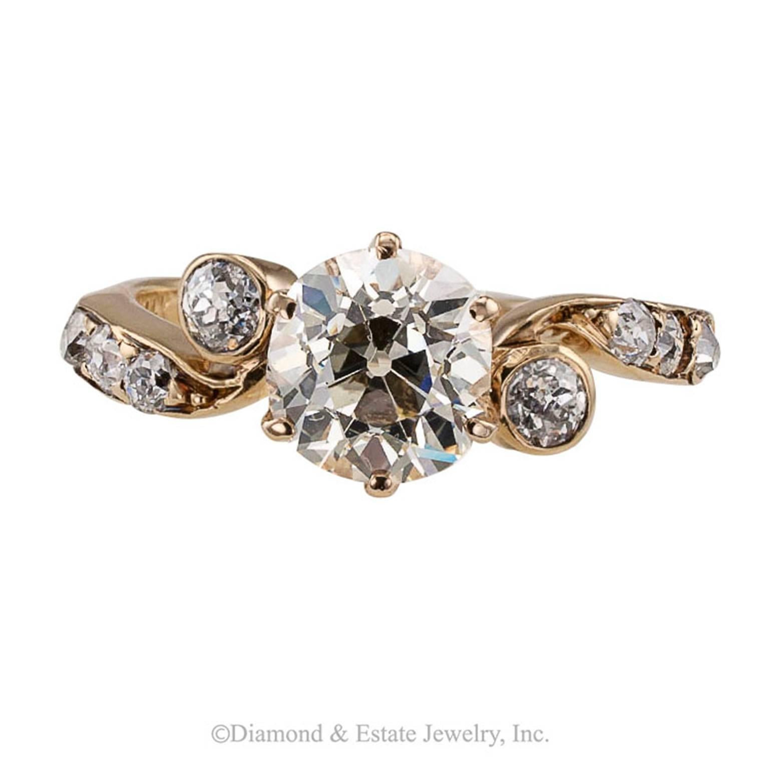 Victorian 1.42 Carats Cushion Diamond Engagement Ring Ca 1890s

Victorian 1.42 carats old cushion diamond and gold solitaire ring circa 1890.  Accompanied by a report from EGL-USA stating that the diamond is L color and VS1 clarity, the 1.42