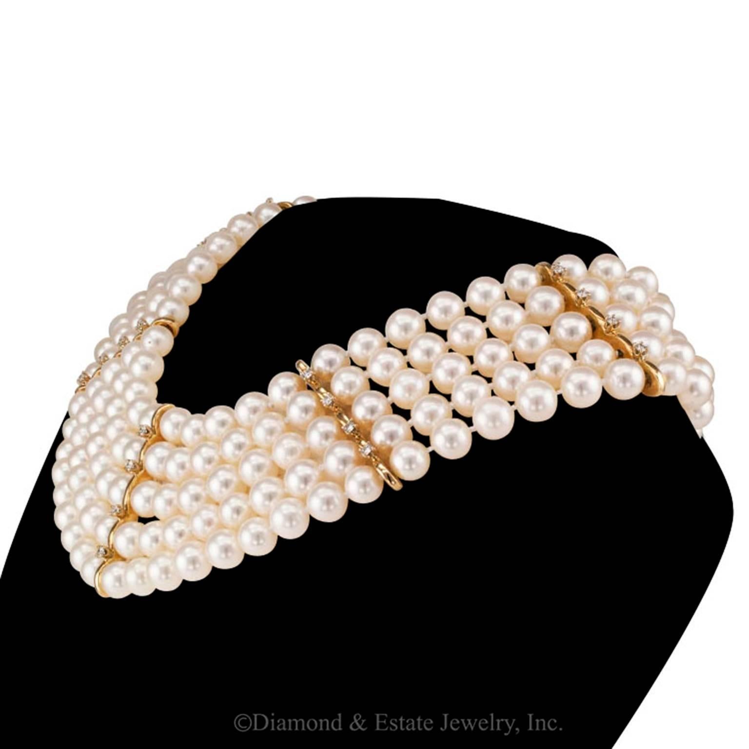 Mastoloni Cultured Pearl Diamond Choker-collar

Mastolony cultured pearl and diamond choker/collar.  Comprising five nested strands of Akoya cultured pearls measuring 6 1/2 - 7 mm with five diamond spacers set at equal intervals to the fore, the