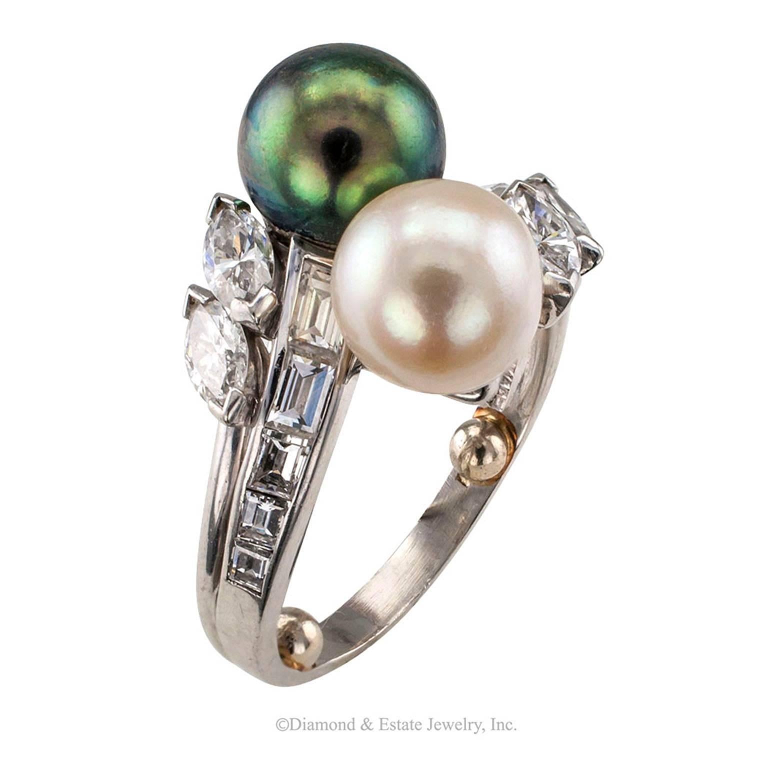 Gubelin 1950s Ying-Yang Pearl Diamond Bypass Ring

Gubelin ying-yang pearl and diamond bypass platinum ring circa 1950. Ultra refined mid-century elegance portrayed by the best quality materials and workmanship that money can buy.  Gubelin a name