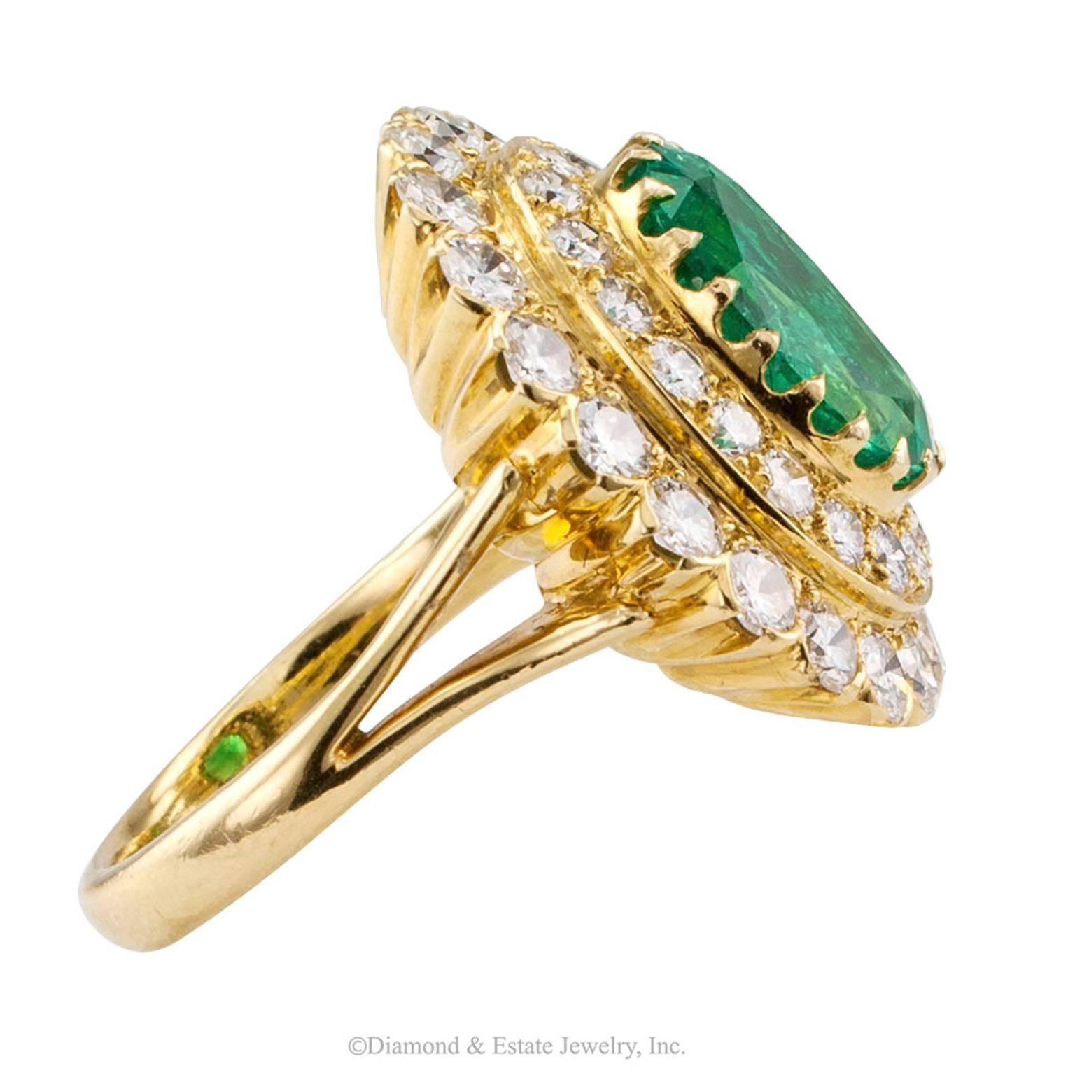 Oval Colombian Emerald Diamond Gold Ring

This oval ring is set with an oval Colombian Emerald weighing approximately 3.50 carats bordered by two rows of round brilliant-cut diamonds totaling approximately 2.00 carats mounted in 18-karat yellow gold