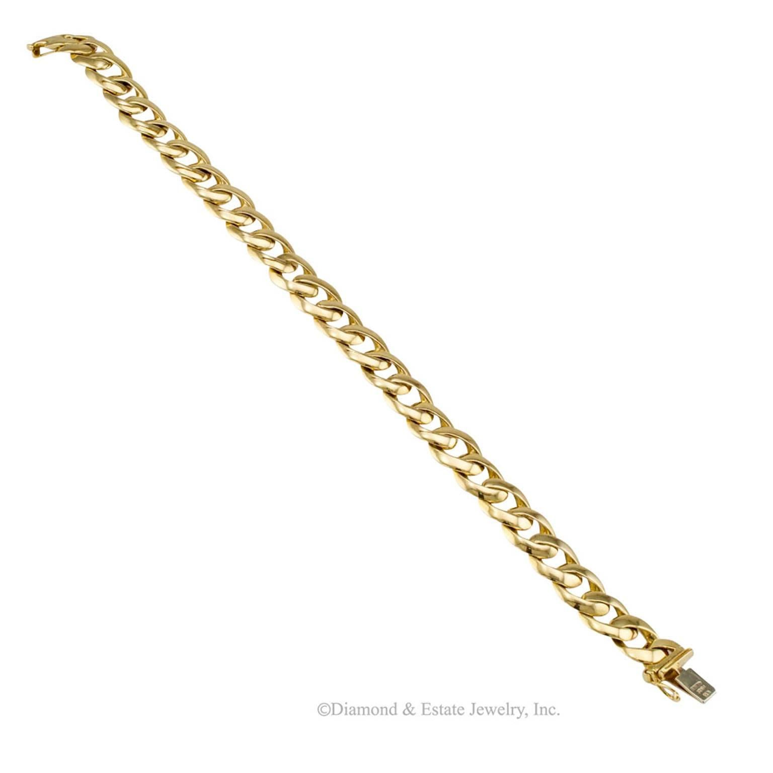 Gentlemans Curb-link Gold Bracelet

Gold gentleman's curb-link bracelet.  The polished, 18-karat yellow gold, elongated links with curbed sides that make up this estate bracelet  denote classic masculine elegance and sophistication.  Dapper and