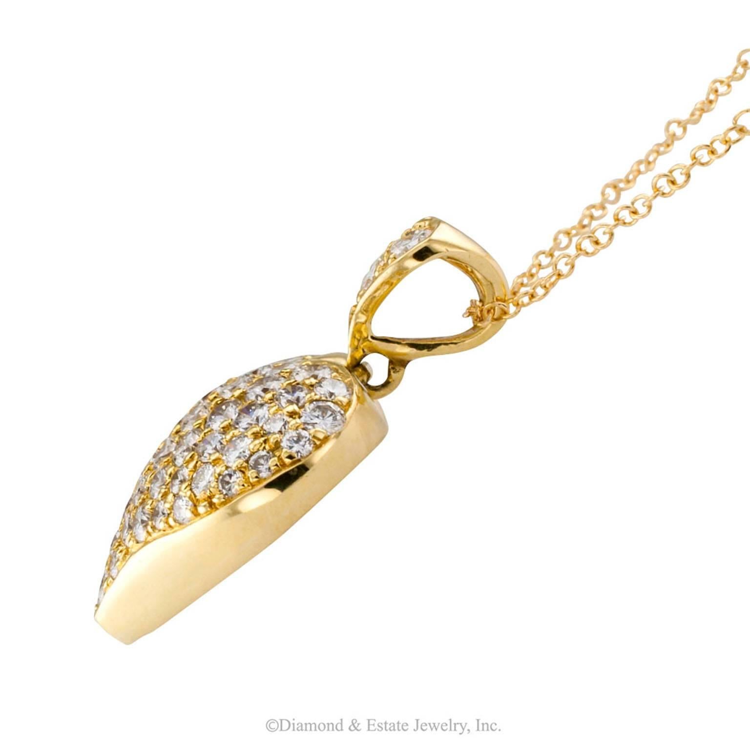 Heart-shaped Diamond Pave Pendant

Estate diamond-pave heart-shaped gold pendant.  It is worth while noting that this lovely heart-shaped pendant is brimming with attention to detail, high quality workmanship and materials. Notice the closed pierced