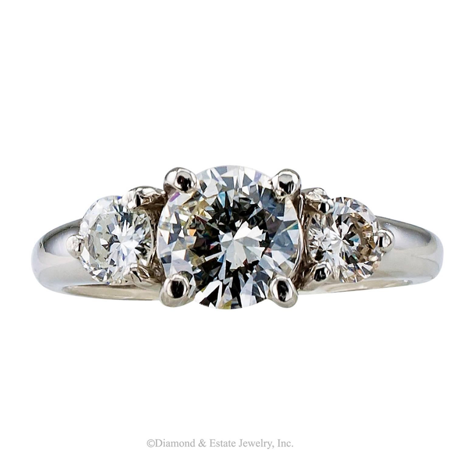 0.96 Carat Center Diamond Three-stone Engagement Ring

Three-stone 0.96 carat center diamond and platinum engagement ring.  One of the most endearing and traditional engagement ring styles, the three-stone diamond ring is king, at the top of the