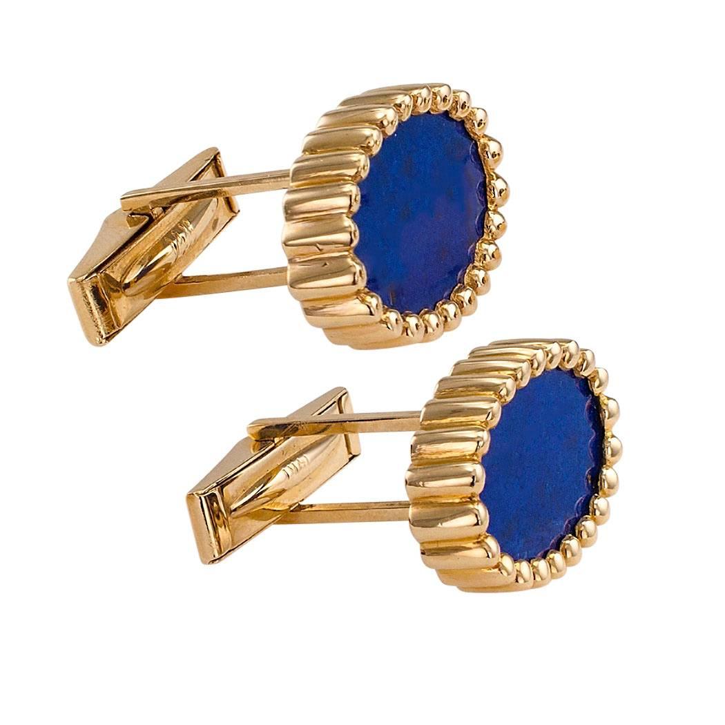 1970s lapis lazuli and gold cuff links. The matching designs feature a pair of oval lapis lazuli displaying a really nice and vibrant shade of blue, a very desirable indicator of good quality lapis lazuli, within a beaded bezel of bright polish