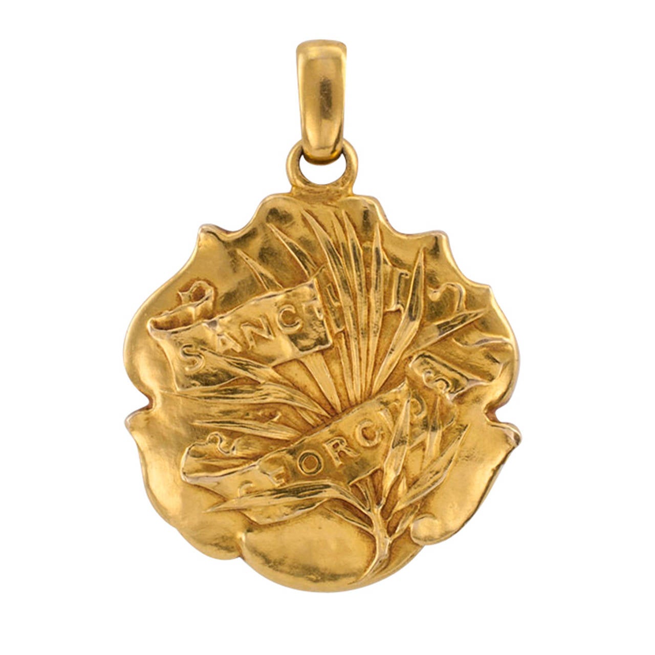 French Art Nouveau 18 Karat Gold Saint George Pendant

This is one of the most beautiful pendants depicting the popular legend of Saint George slaying the dragon ever acquired for our estate jewelry collection.  Time, in a manner that only time