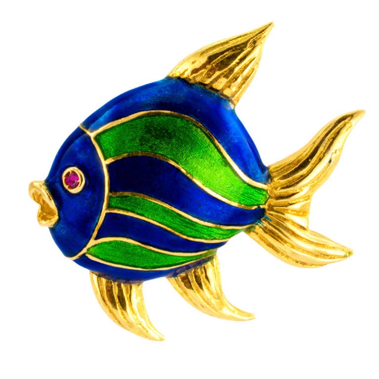 Rare Cartier New York Animalia Series Peacock Enamel Gold  Angel Fish Brooch. Signed Cartier and numbered. 1960s.

An angel from the waters of paradise with lustrous blue enamel face and body, the latter highlighted with alternating bands of