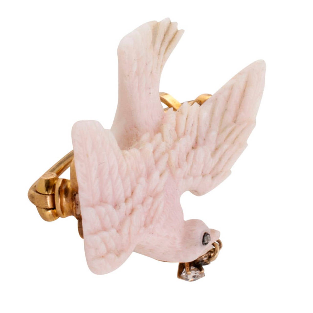Victorian Carved Pink Coral And Diamond Dove Brooch

The exotic color of pink coral carved in great detail into the shape of a dove in flight.  All right, Victorians!  Skip the olive branch and bring me a diamond.  This quite a rare and unusual