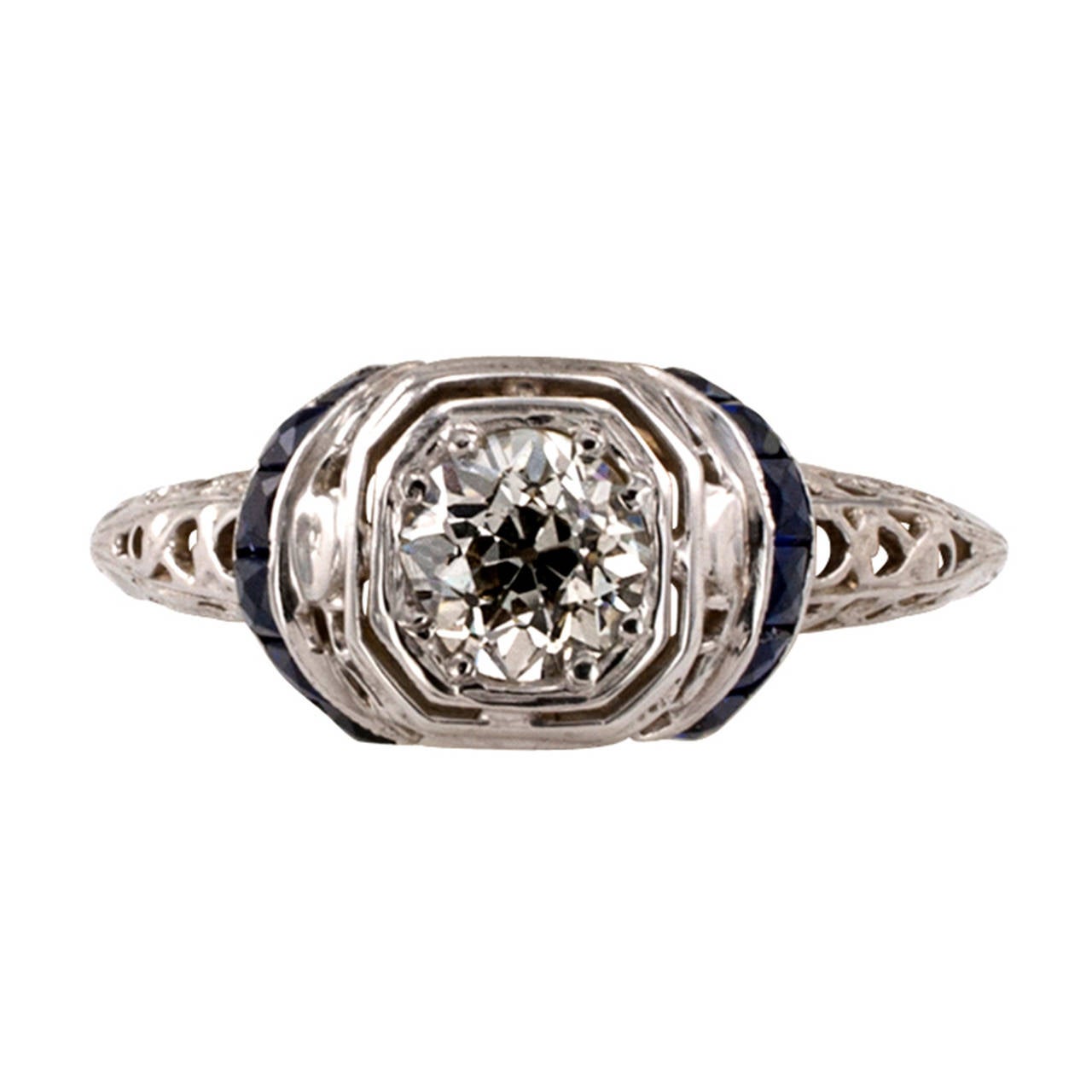 0.45 Carat Diamond Art Deco Solitaire Engagement Ring

    Designed with someone in mind who just loves filigree work.  This lovely       18 karat white gold mount is loaded with gorgeous filigree details and, at the top center of it sits a really