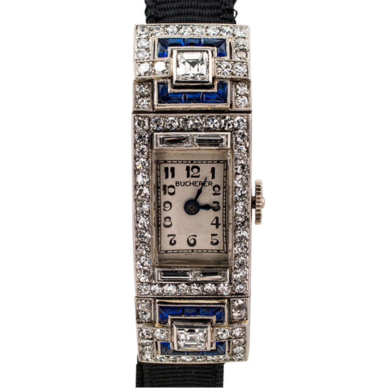 Bucherer Art Deco Diamond And Platinum Ladys Wristwatch

Here is one of those timeless timepieces, elegant and chic, so very, very 
Art Deco.  The rectangular case, nicely engraved on the sides, is embellished with eighty four diamonds of various