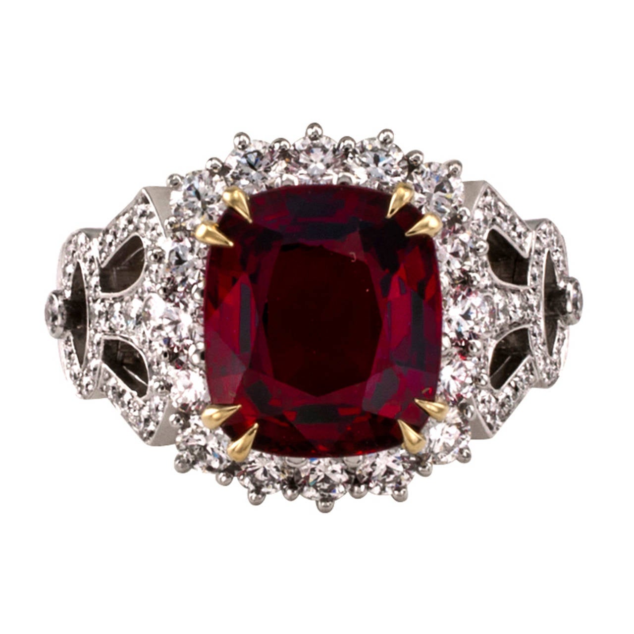 Garrard Estate Red Spinel And Diamond Ring

This beautiful contemporary design centers upon a fine, gold-set, electrifying cushion-shaped red spinel weighing approximately 3.75 carats, on an attractive platinum mount set with 74 round