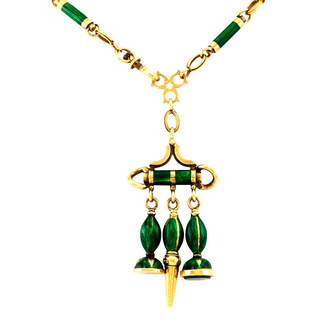 French Green Enamel and Gold Antique Necklace

Be the mistress of the castle!  Fashioned from a French Victorian chatelaine (by definition worn by the mistress of the chateau) comprising a watch key and two fobs, one gold; the other bloodstone. 