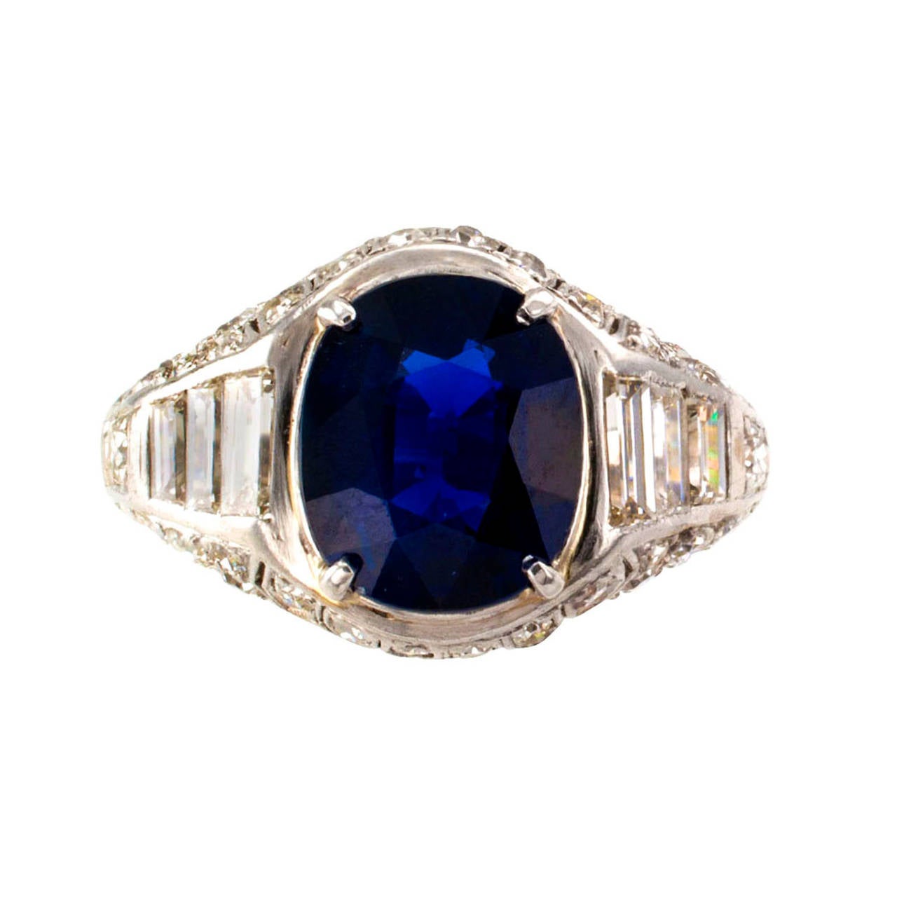 Unheated 2.93 Carats Blue Sapphire and Diamond Art Deco Ring

Accompanied by a report from American Gemological Laboratories stating that the sapphire weights 2.93 carats, of Burmese origin, not heated natural blue color.  A rare gem kindled into