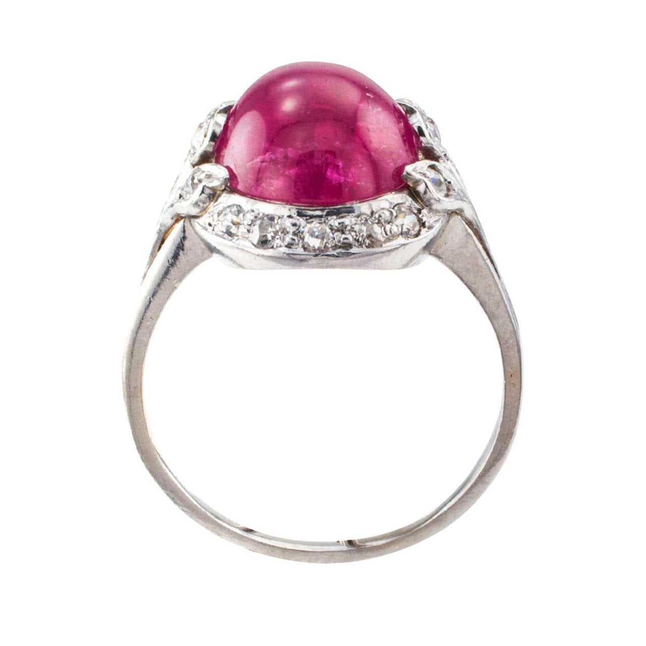 Cabochon Ruby and Diamond Art Deco Lady's Ring

You know that neither you, nor your taste for the good things in life fits the mold, or that which is mainstream.  That is why you are so attracted to this outstanding Ruby Gem with all its candy