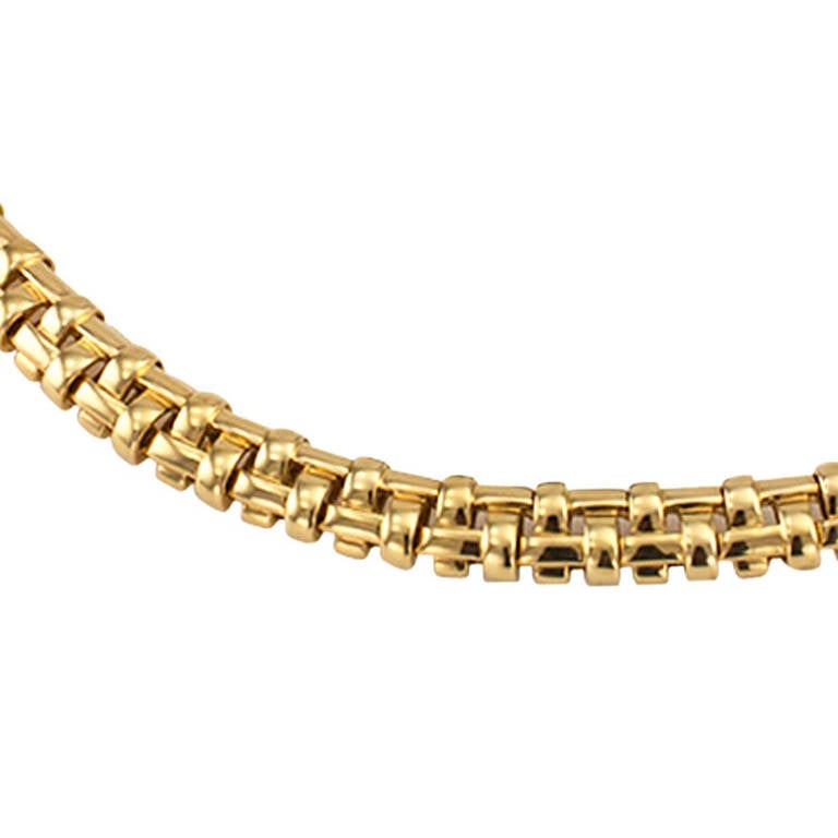Tiffany & Co Estate Basket Weave Gold Link Necklace

Circa 2002, this elegant and timeless design composed by a line of flexible basket-weave links expressing strength and support, 16