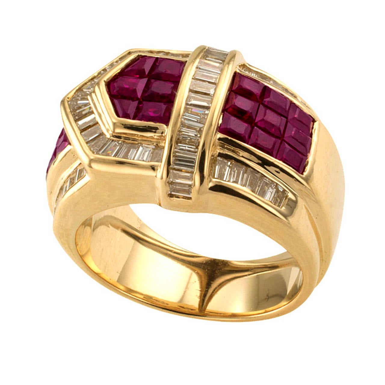 Circa 1980, this ruby and diamond ring designed as buckle and strap, comprising the strap formed by invisibly set rubies weighing approximately 1.50 carats and the buckle of channel-set baguette diamonds totaling approximately 1.75 carats,