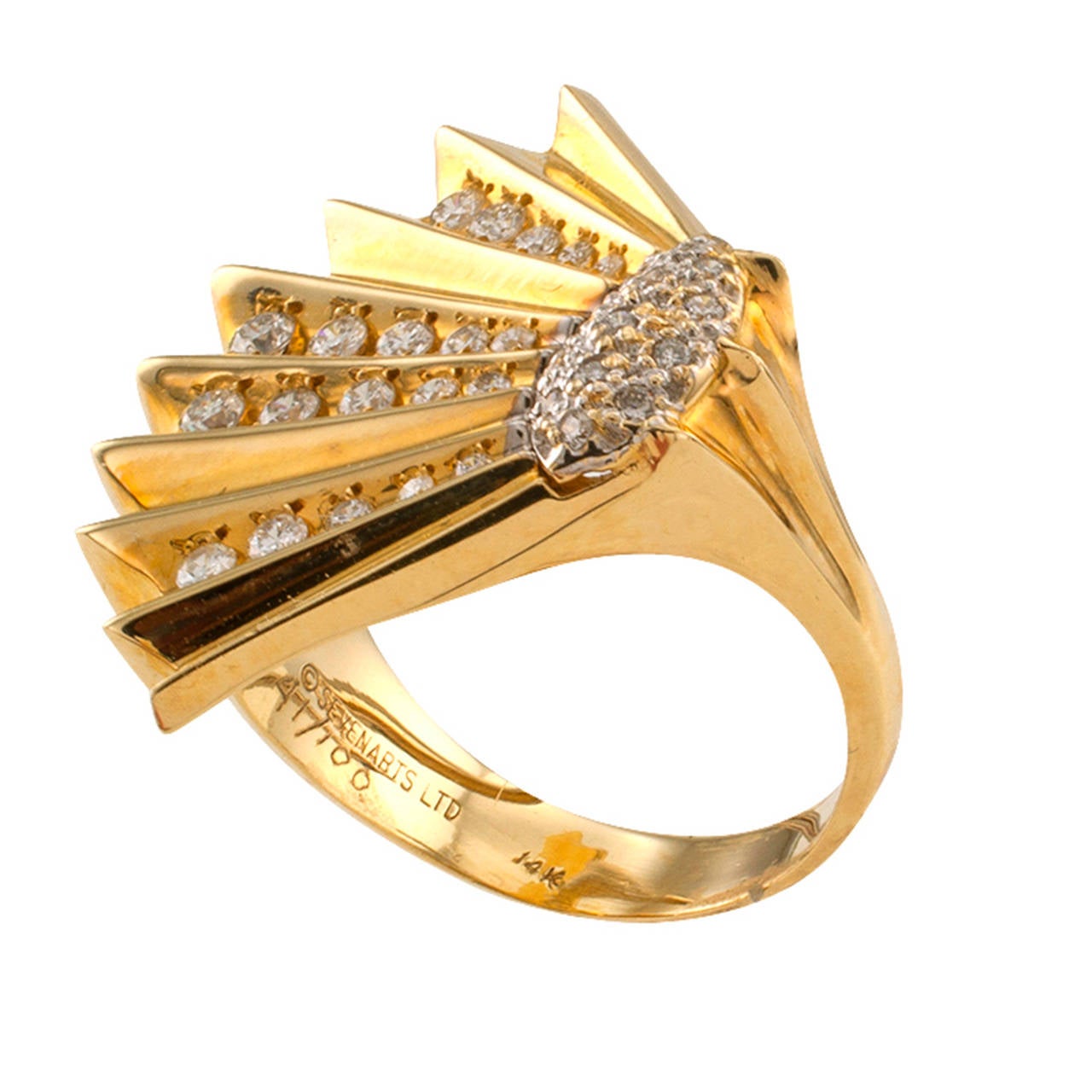 This unique 14 karat gold and diamond ring, signed Erte, numbered 41 out of a limited edition of 100, its unique aesthetics composed by a fan-shaped design fanning out across the hand with diamonds set inside its folds from a diamond pave motif to
