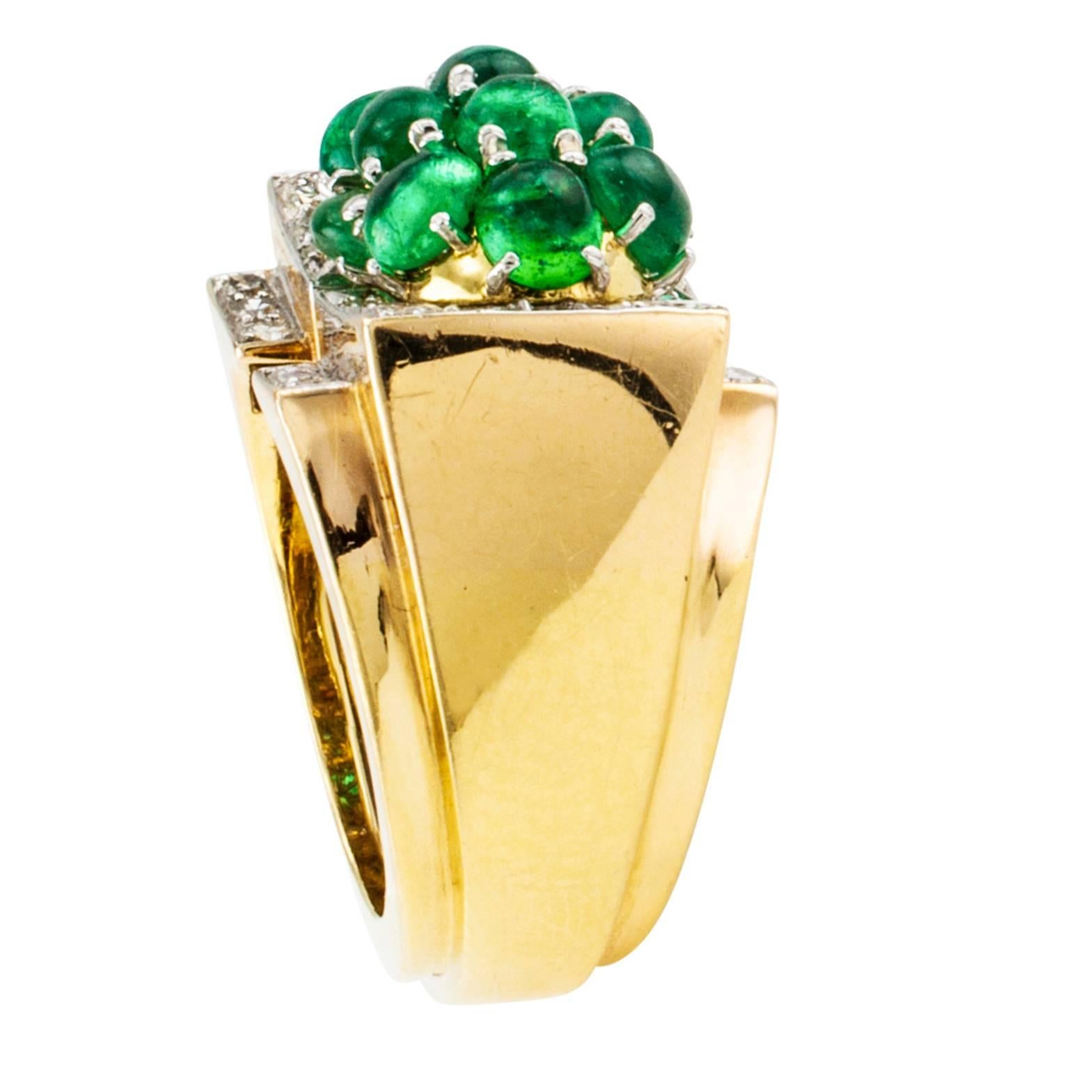 David Webb Estate Emerald and Diamond Ring

This David Webb ring with sensuous curves and angular geometry come together in a design that is assertive and attractive without compromising boldness and style.  It is a ring that will be noticed when