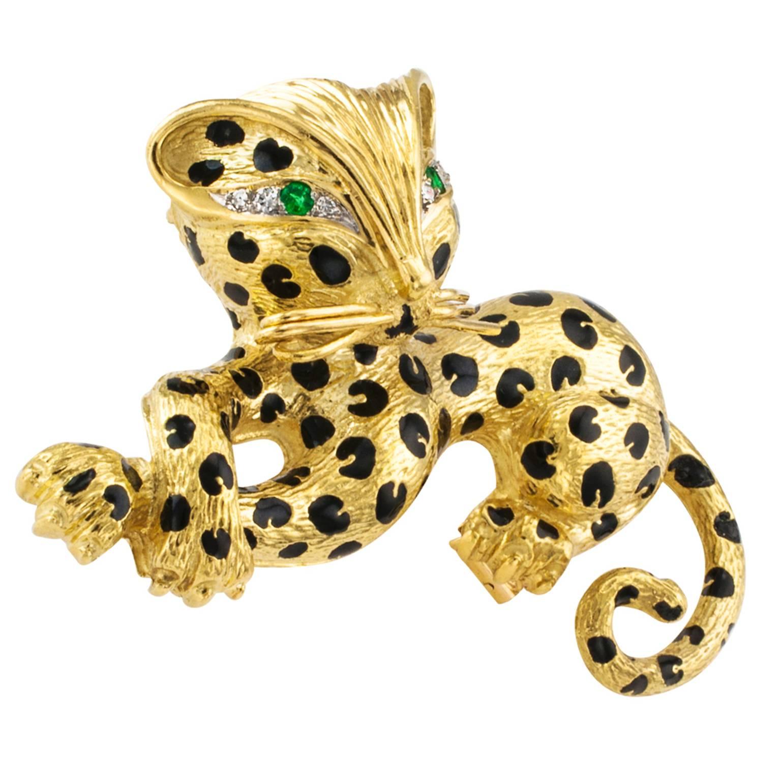 Fred Paris Estate Whimsical Leopard Brooch

What a personality...  and those captivating eyes that sparkle ever so brightly.  Suave. Tres jolie!  En suite with a pair of coordinated ear clips, reference E2291.  In 18 karat gold, the eyes are set