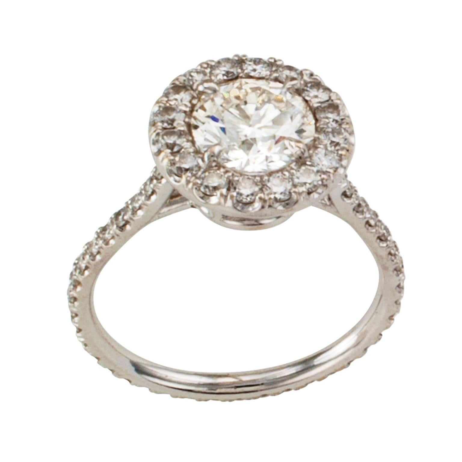 Estate Diamond Halo Engagement Ring

An exciting and more contemporary halo engagement ring beautifully crafted in 18 karat white gold featuring a round brilliant-cut diamond weighing approximately 1.20 carats, approximately J - K color and SI1