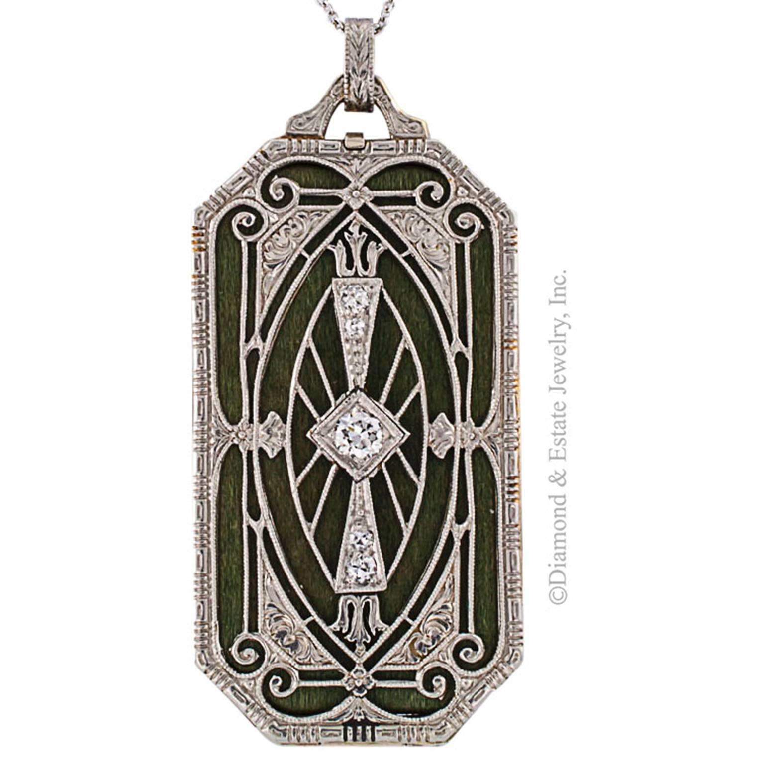 Art Deco Diamond Gold Platinum Vinaigrette Pendant

High craftsmanship that strikes the perfect note between beauty and uncommon functionality.  Rare and incredibly ornate, this magical jewel is captivating from every angle.  The platinum topped,