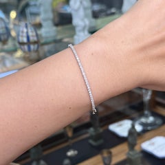 Bracciale a mezzo giro con diamanti in oro bianco 14k