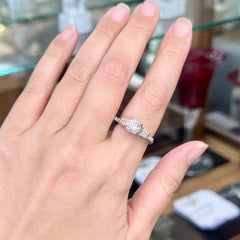 Round and Baguette Diamond Engagement Ring Platinum