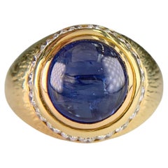 Anillo vintage de los hermanos Hammerman con zafiro cabujón, diamantes y oro amarillo de 18 quilates