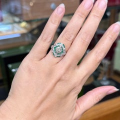 Anello in platino con smeraldi e diamanti in stile Art Déco d'epoca