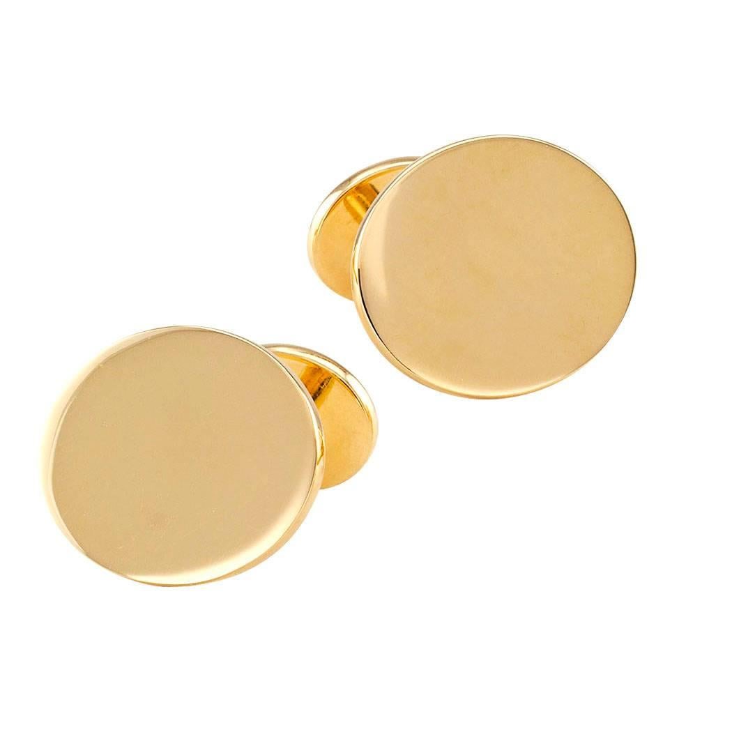 Tiffany & Co Gold Cufflinks

Tiffany & Company gold cuff links circa 2002.  Simple designs maximizing the visual impact of perfectly polished 18-karat yellow gold.  In Tiffany & Company terms, that translates into luxurious, unsurpassed